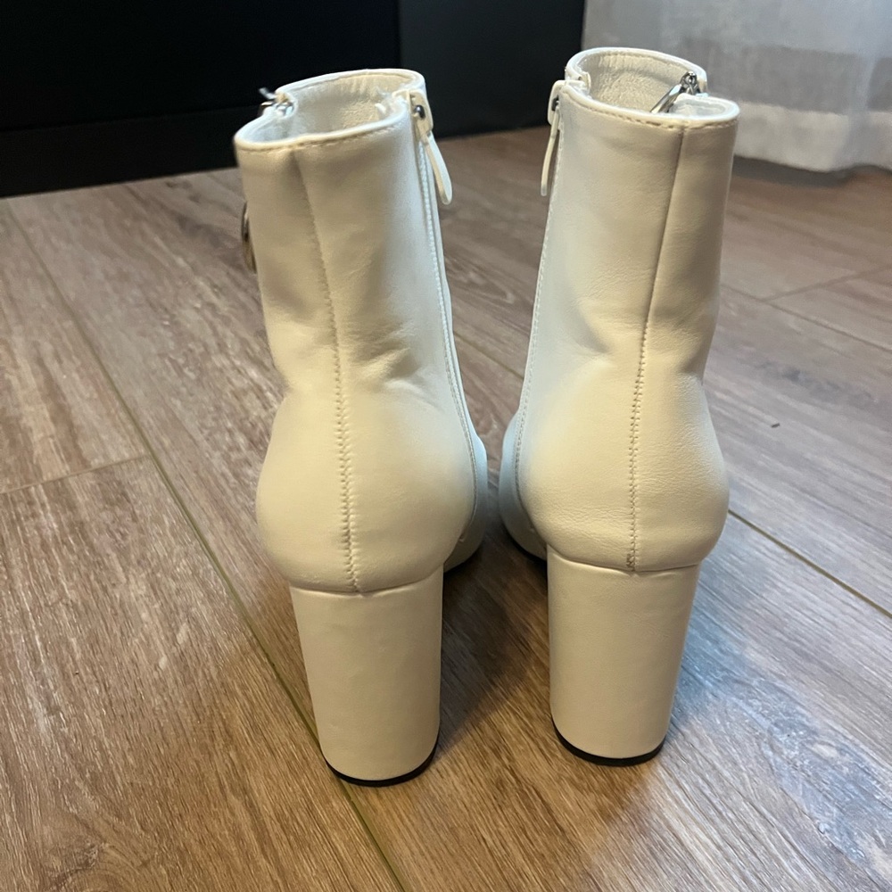 White heeled boots